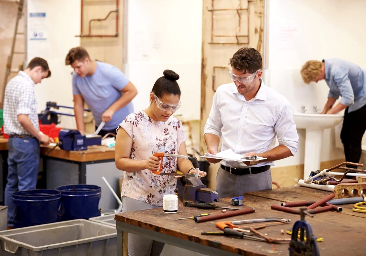 Participants earning income on a real paid work-based learning project